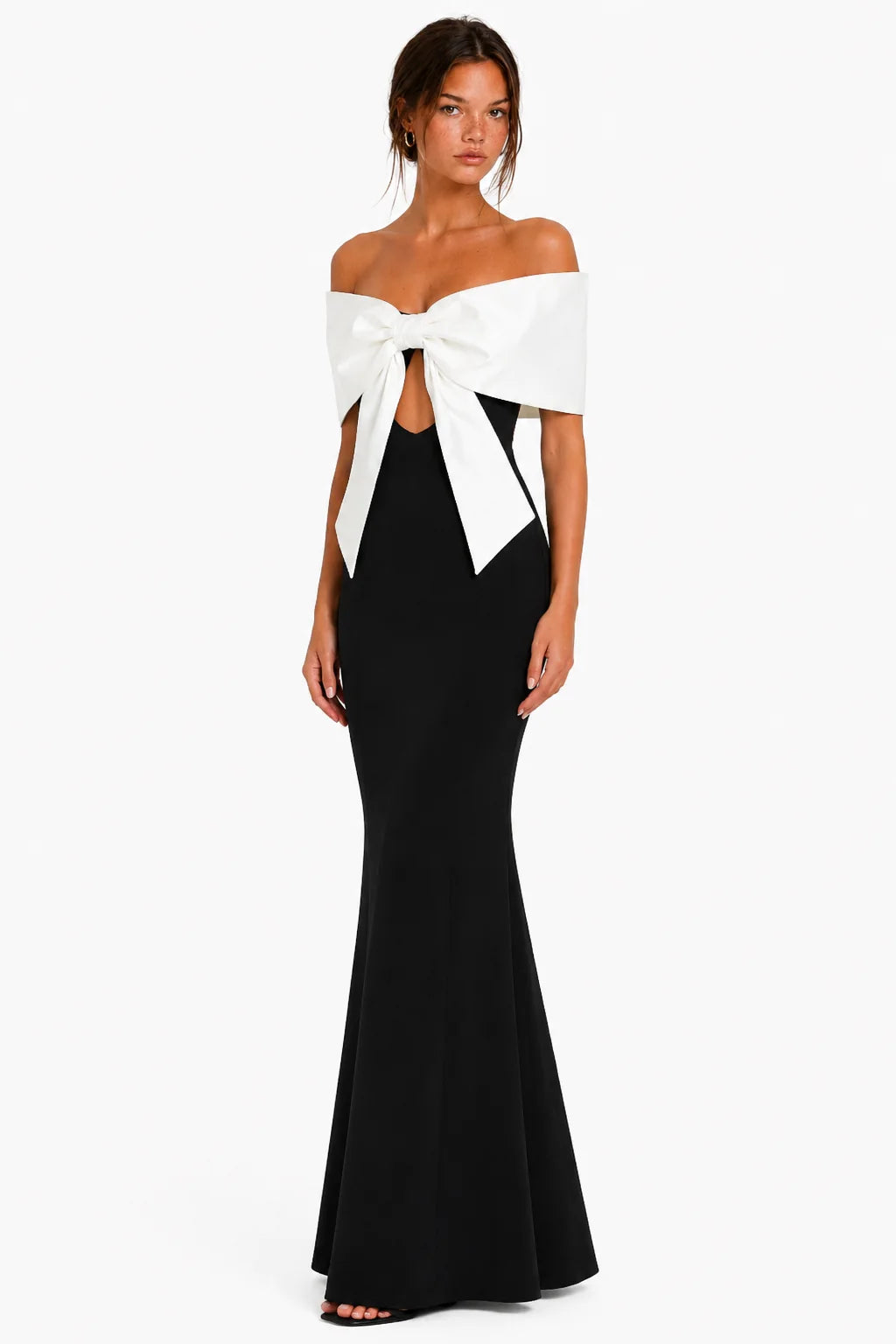Front detail of black off-shoulder bow bandage maxi dress