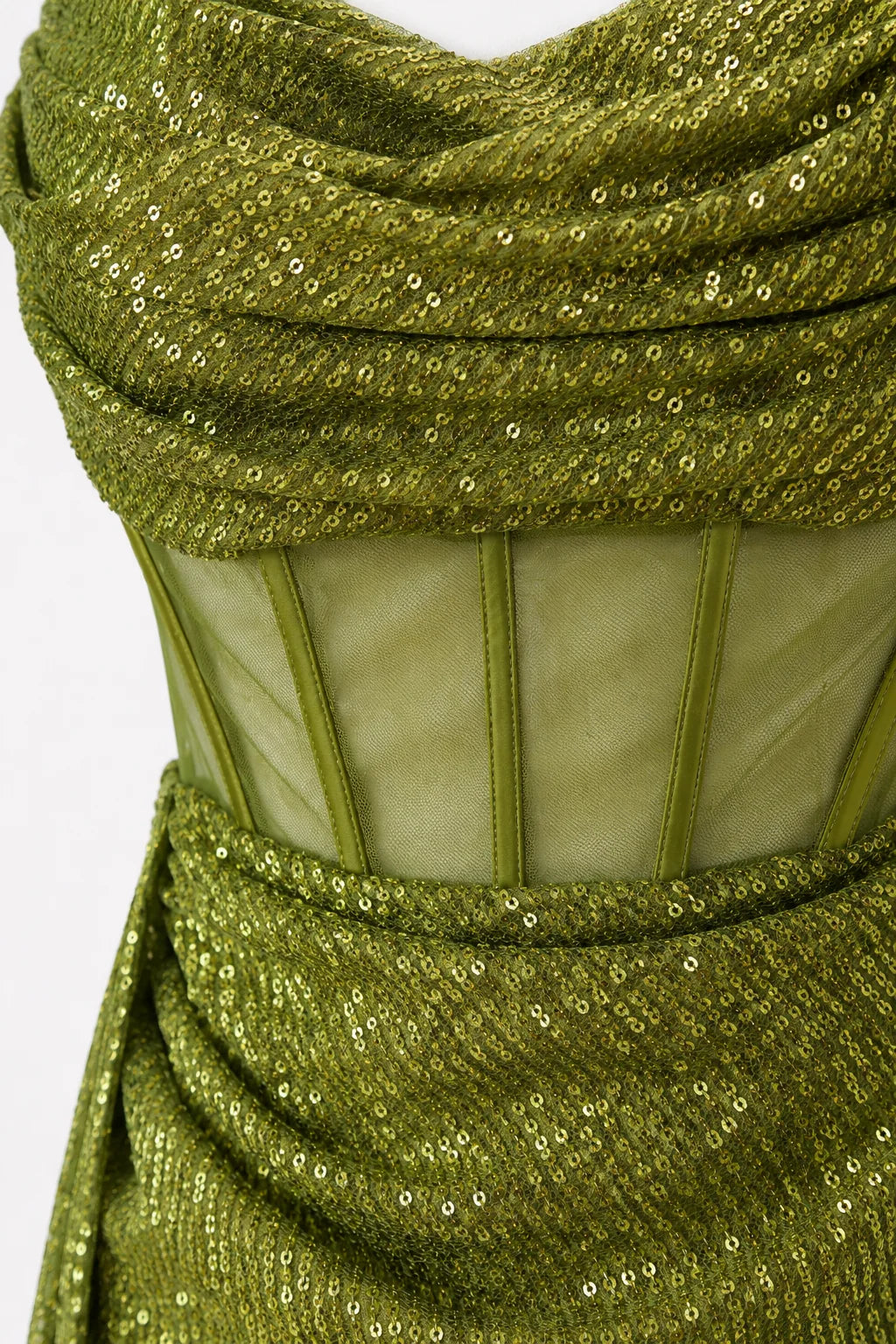 Fabric close-up of olive green sequin mini dress